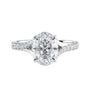 Oval diamond engagement ring with diamond set twist style band white gold front view.