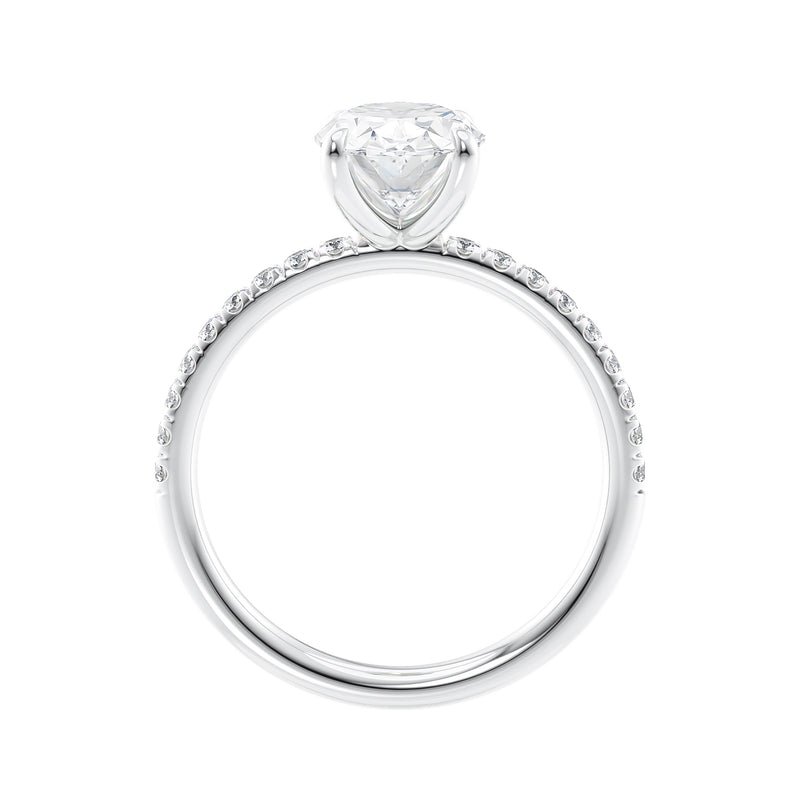 Oval diamond engagement ring with diamond band white gold side view.