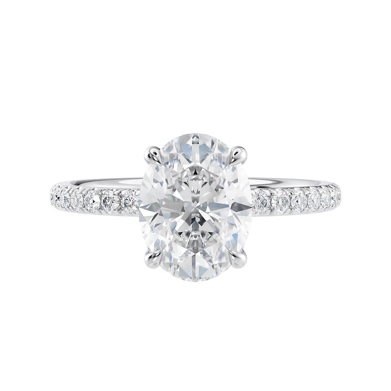 Oval diamond engagement ring with diamond band white gold front view.