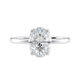 Lab grown oval diamond solitaire engagement ring with contemporary setting white gold front view.