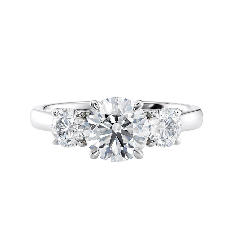 Round brilliant cut 3 stone diamond engagement ring white gold front view.