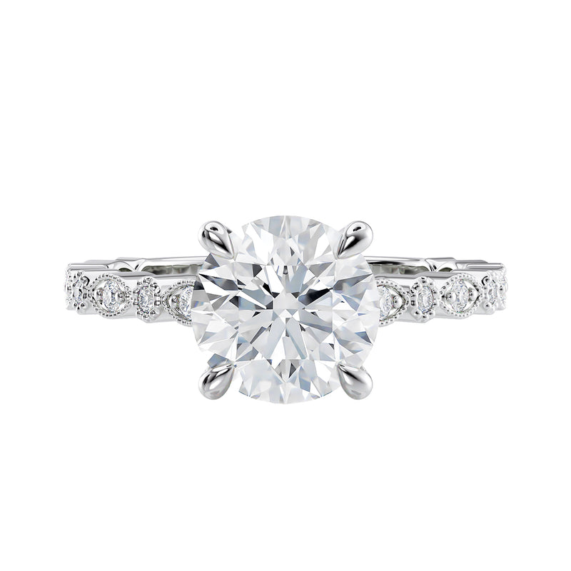 Vintage style solitaire engagement ring in white gold front view.