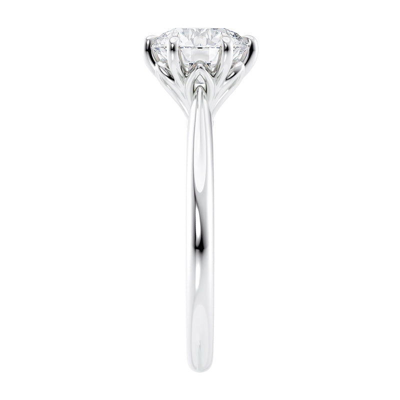 White gold 6 claw solitaire diamond engagement ring end view.