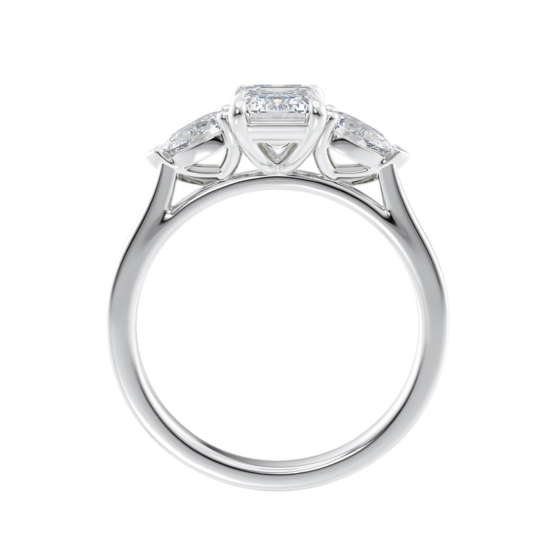 Emerald cut diamond engagement ring with pear cut sides white gold side view.