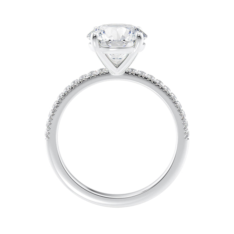 Brilliant cut lab grown diamond solitaire engagement ring with slim diamond set band white gold side view.