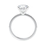 Brilliant cut lab grown diamond solitaire engagement ring with slim diamond set band white gold side view.