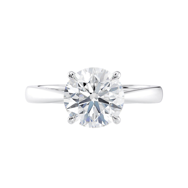 Round cut diamond solitaire engagement ring white gold front view.