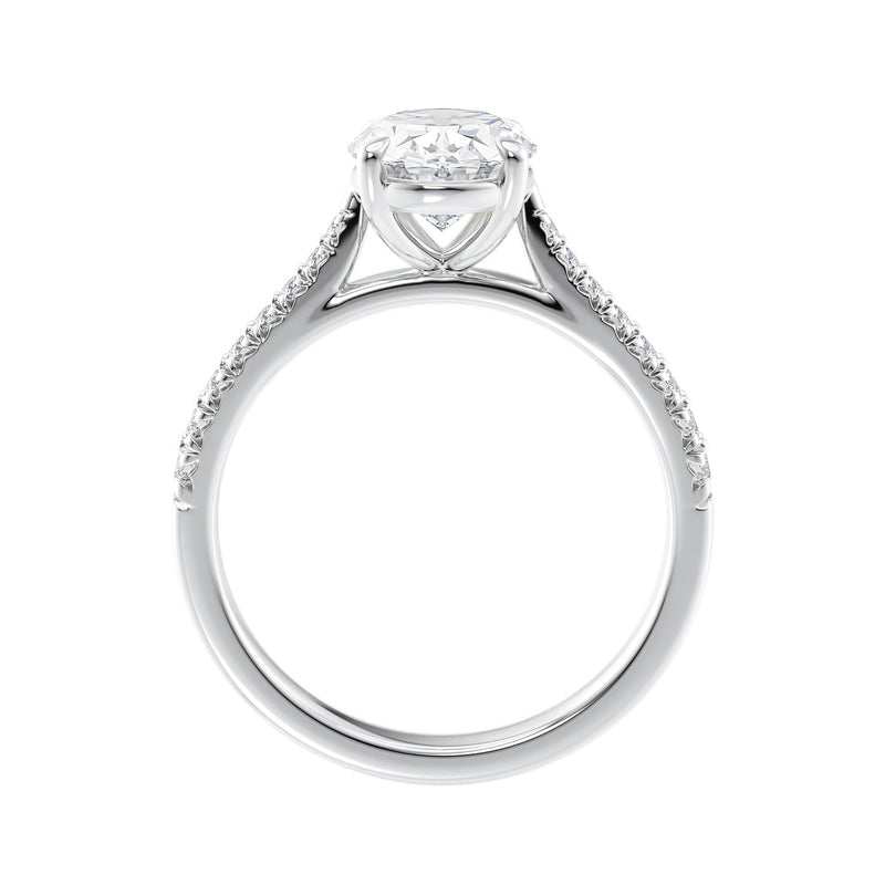 Natural oval cut engagement ring with tapered diamond white gold band side view.