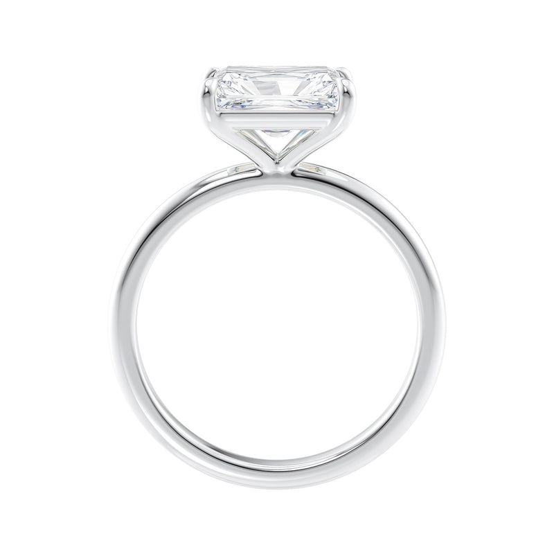 Radiant cut lab grown diamond east-west set on thin band white gold side view.