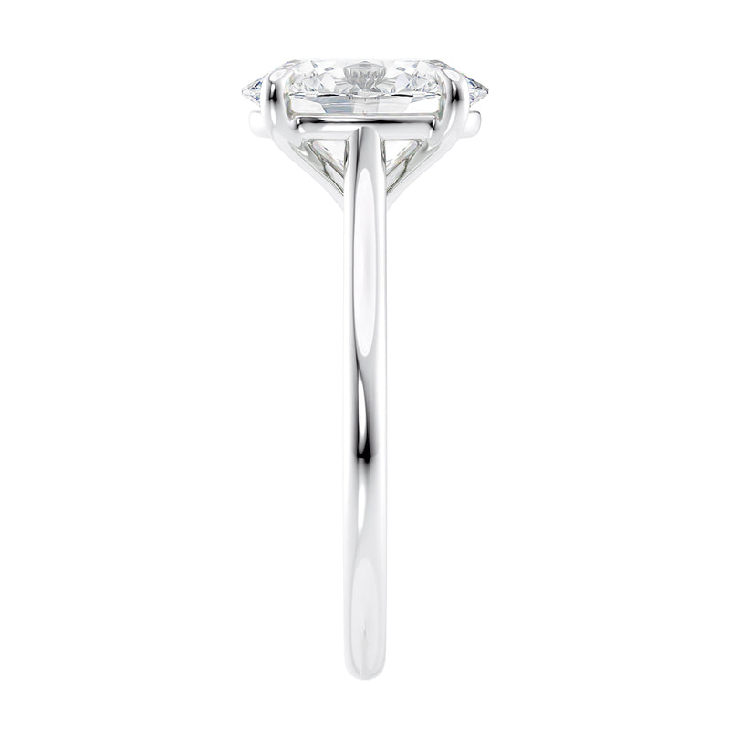 Oval solitaire with ultra slim white gold band end view.