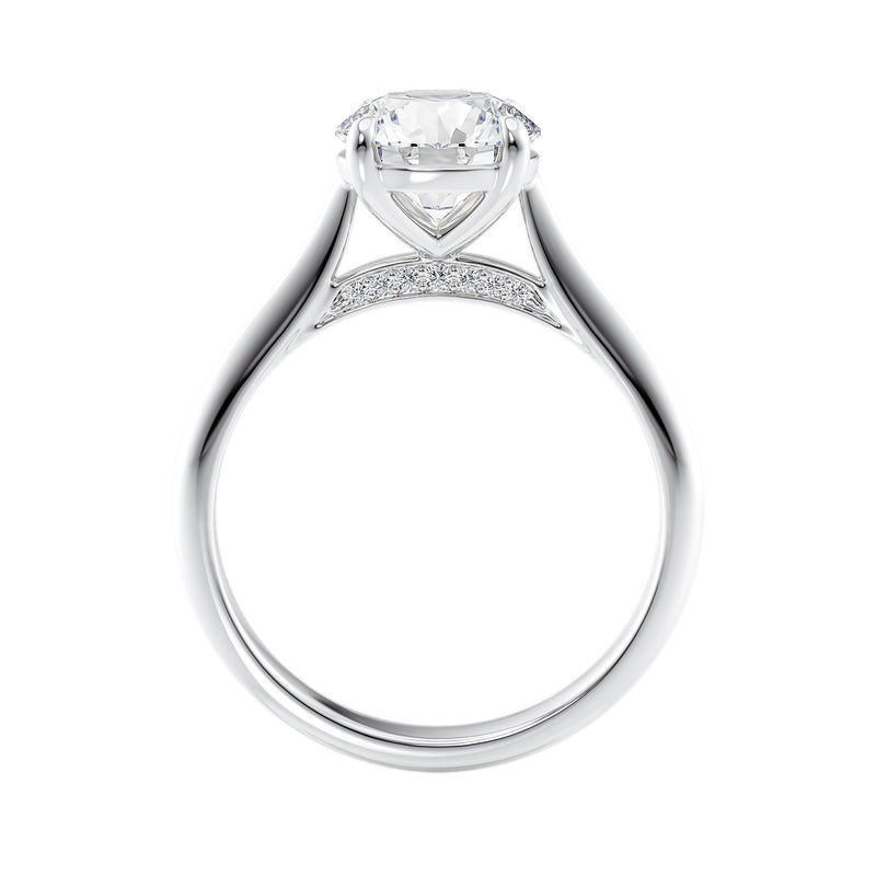 Natural round solitaire with hidden diamond bridge white gold side view