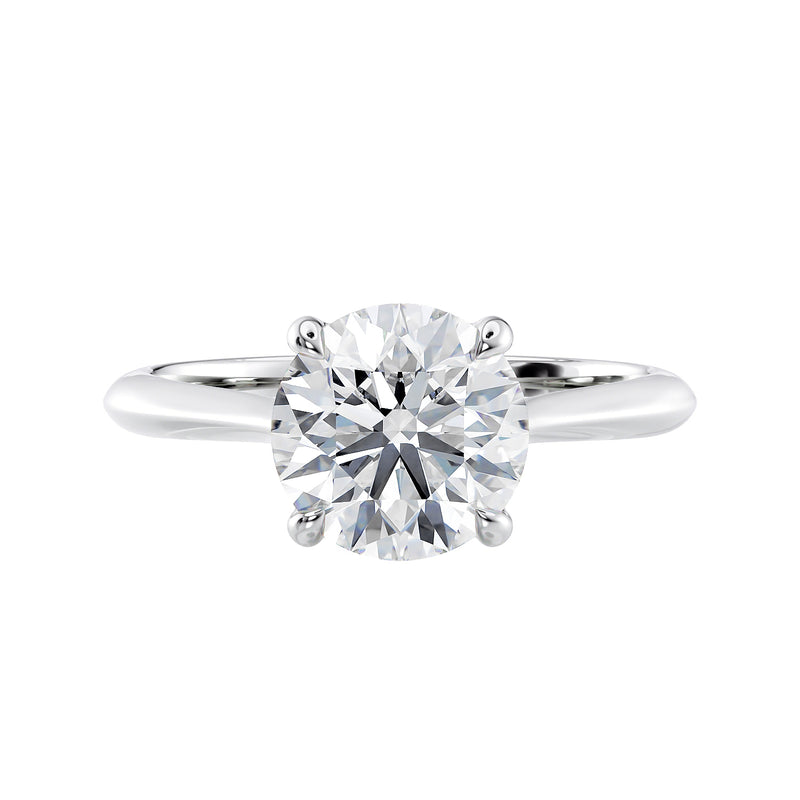 Natural round solitaire with hidden diamond bridge white gold front view